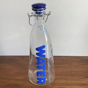 NWOT. Vintage Glass Water/Refrigerator bottle with clamp closure.